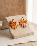 Pendientes Kaiora marmoleados naranja crema rosa con destellos dorados