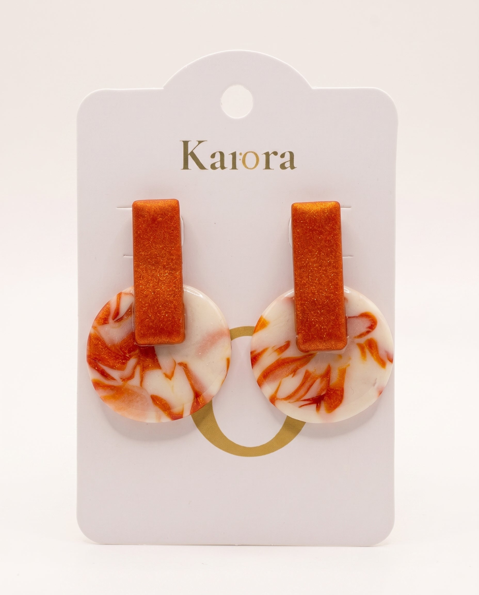 Pendientes Kaiora geométricos marmoleados naranja y crema